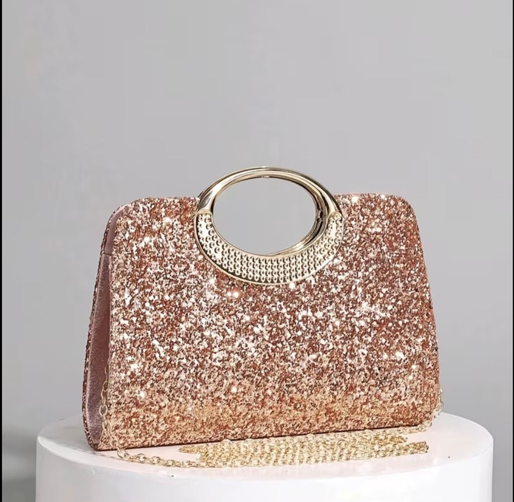 Rose gold glitter evening bag with ring handles and chain