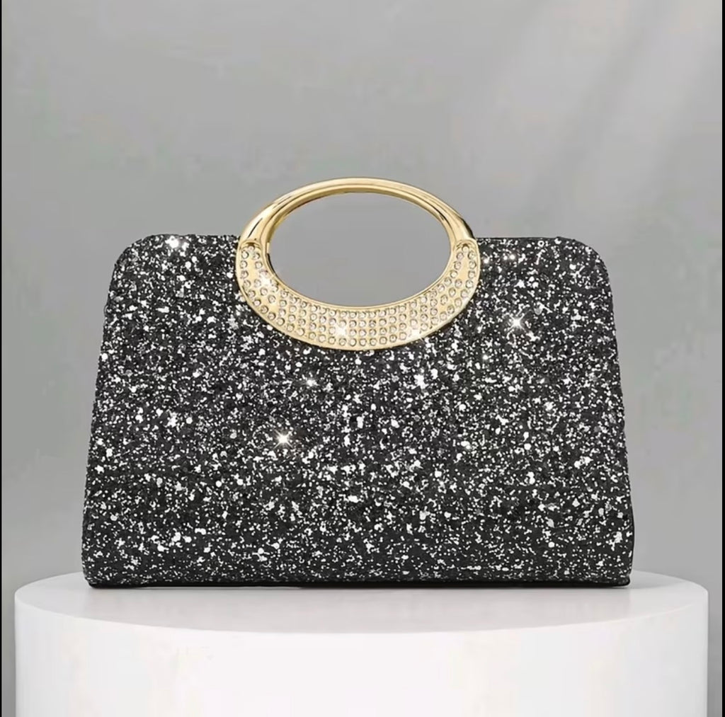 Black glitter evening bag with gold tone handles