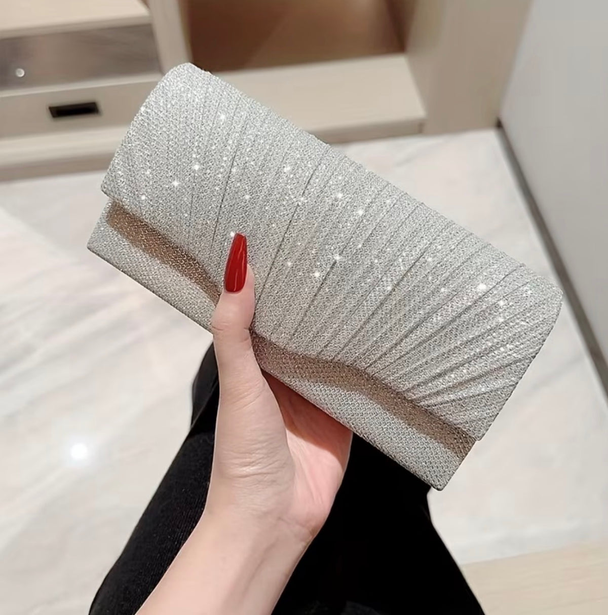 Silver glitter evening clutch bag