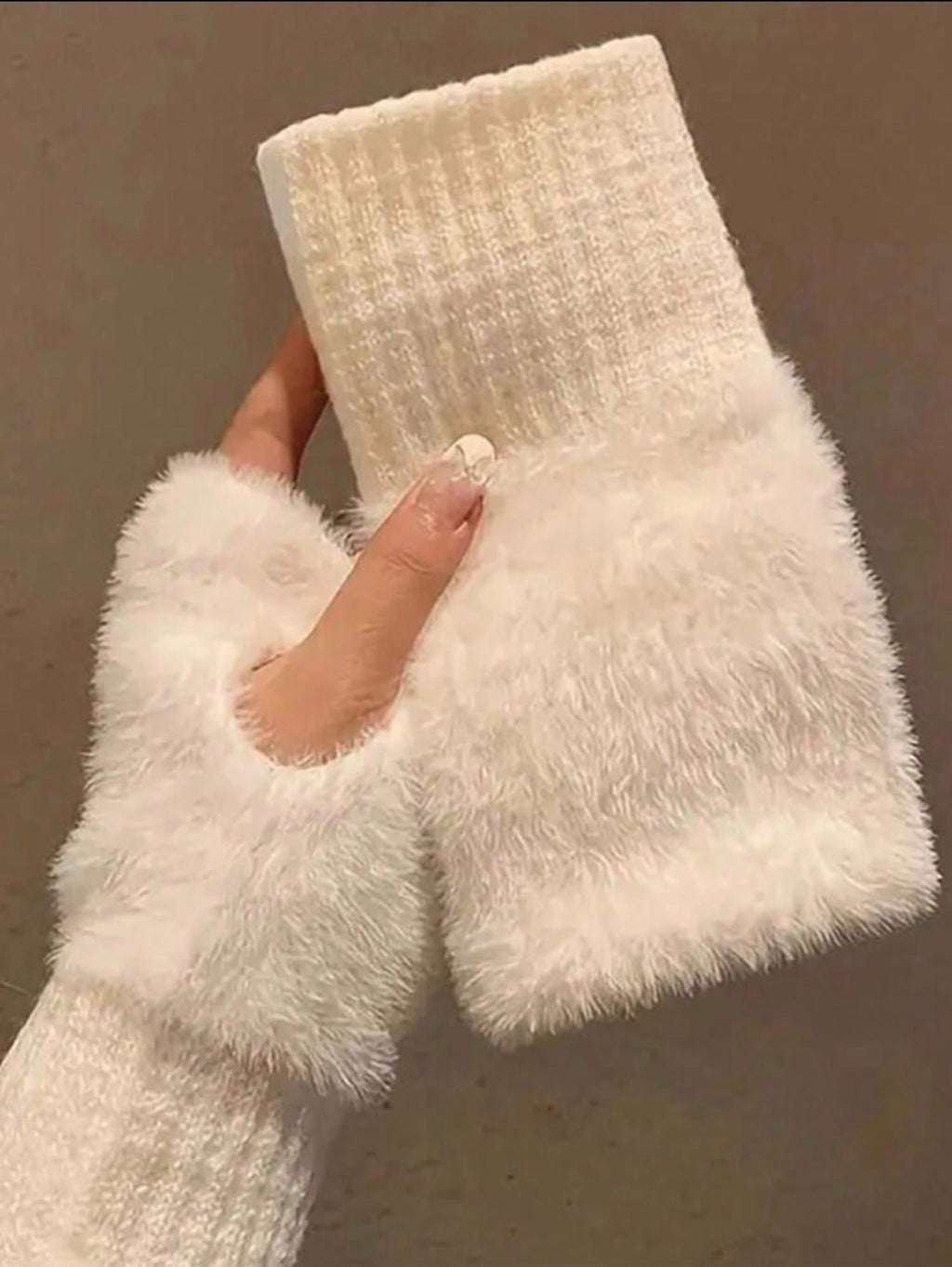 White plush fingerless gloves detail